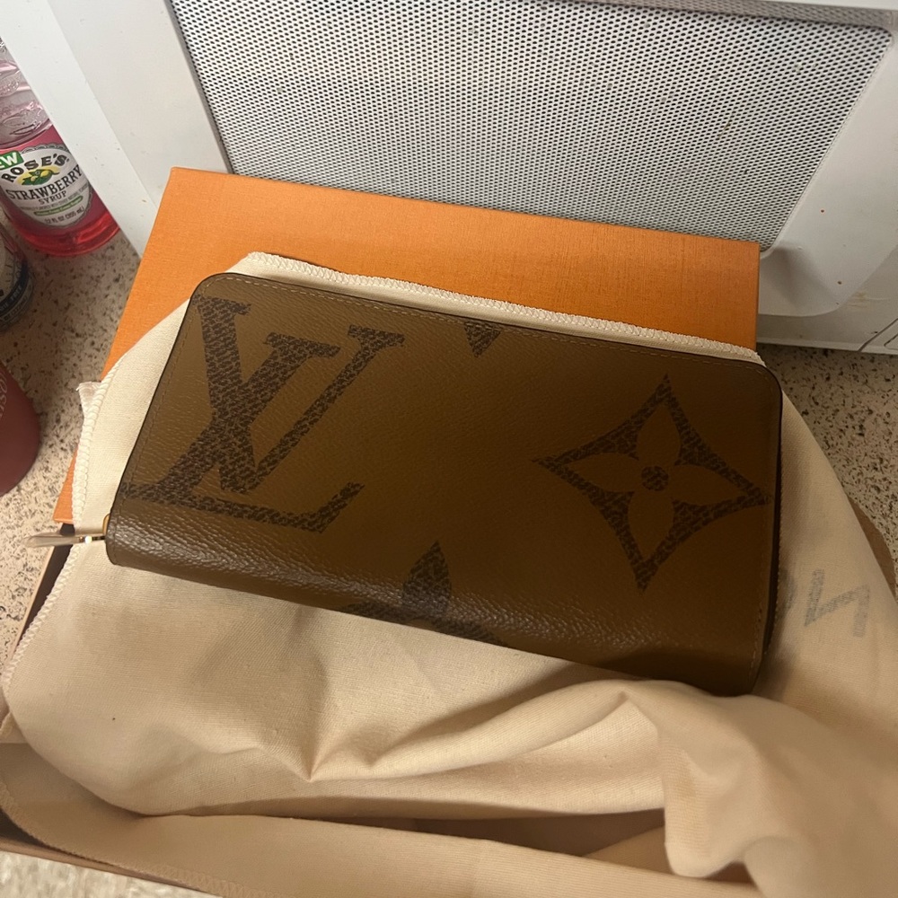 Giant monogram reverse zippy wallet